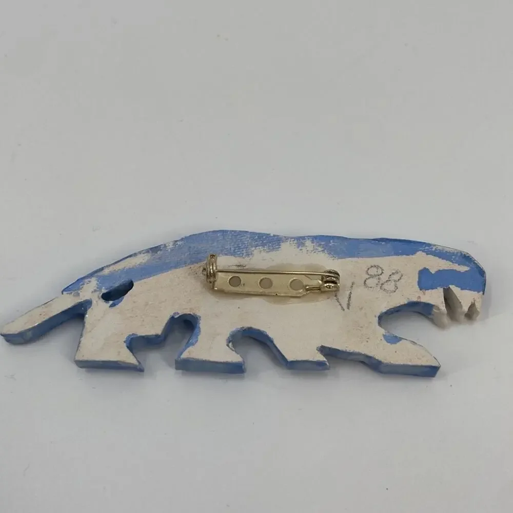 Vintage blue ceramic sabertooth tiger pin
